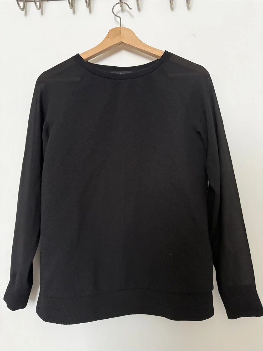 Black crewneck textured top with sheer sleeves - size S/P